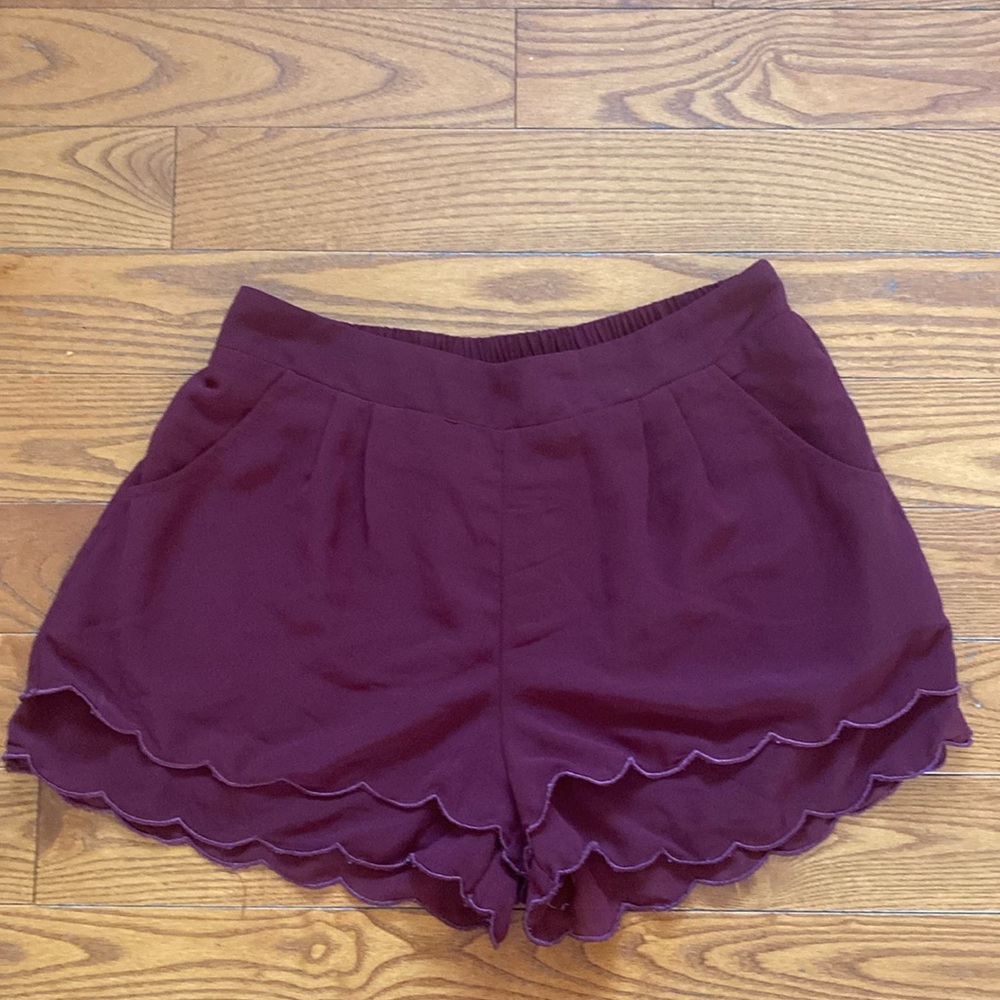 Gypsy Warrior maroon women’s shorts size medium layered with scalloped hem.